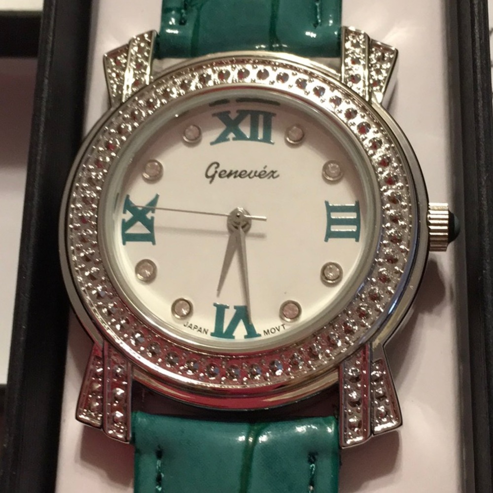 NWT, watch, faux alligator leather band. Green. Very chic looking.